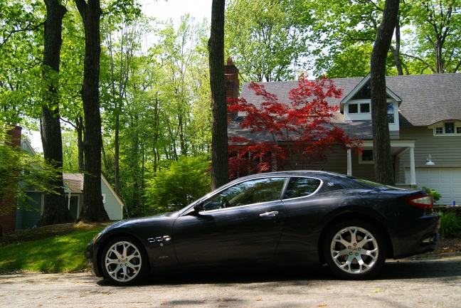  and the steel grey Maserati GranTurismo fills my vision